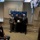 Lucas receiving the award